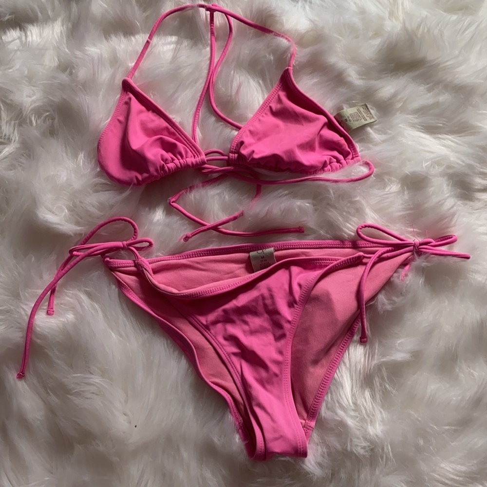Pink string bikini worn a little bit